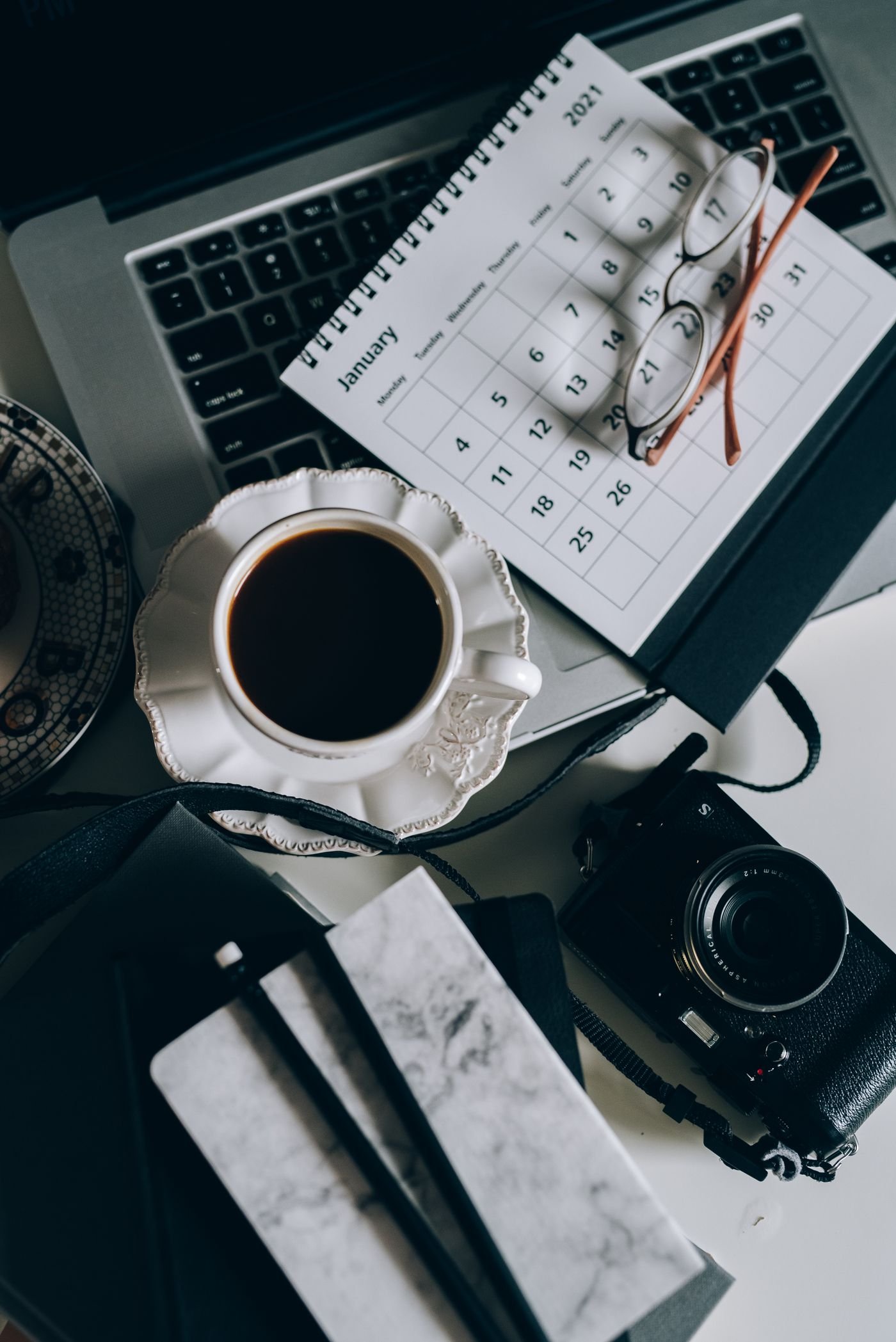 An organized planner and tidy desk