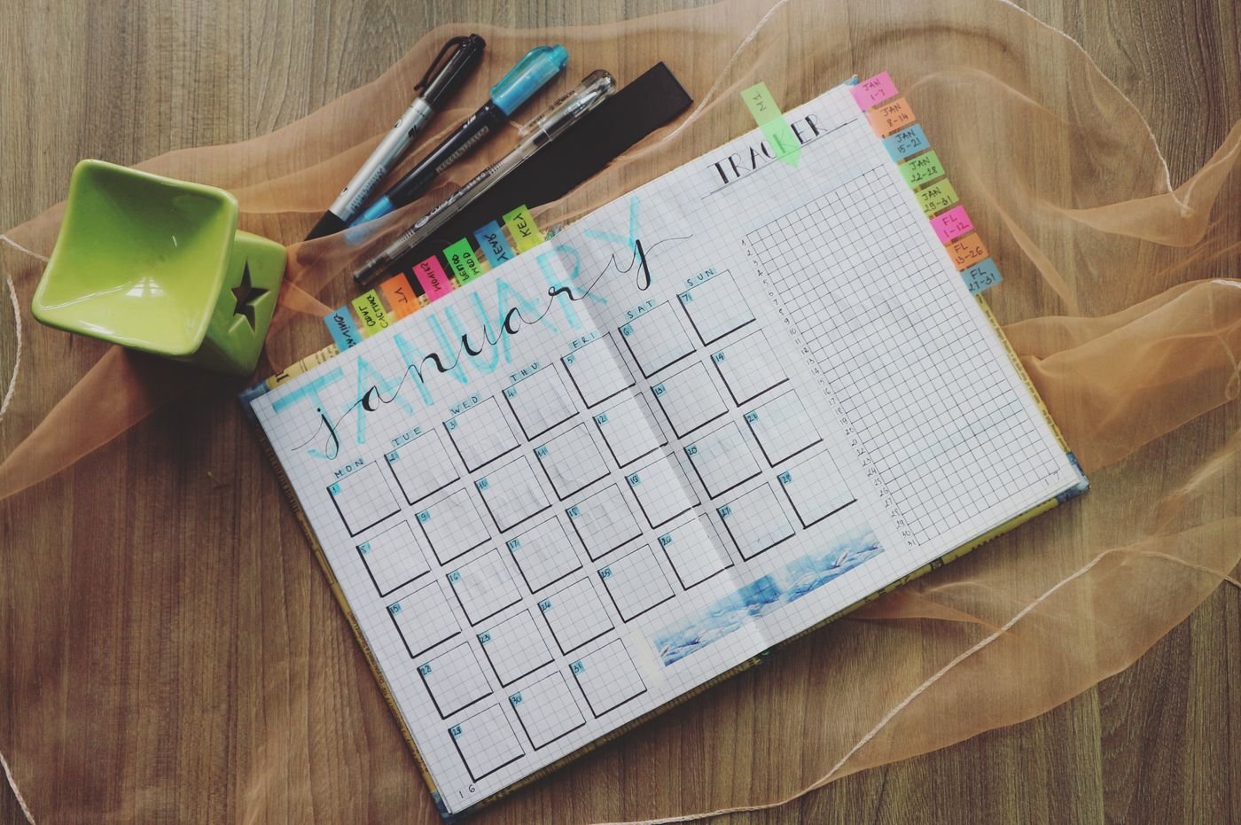 An organized planner and tidy desk representing clear delegation